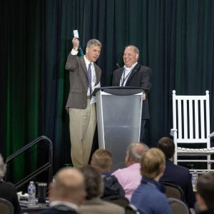 Pictured: CEE Dept. Chair, Glenn Moglen, receiving a pair of CLT Airport socks from Charlotte-Douglas International Airport’s Chief Infrastructure Officer, Jack Christine.