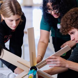 Pictured: High school students working on their wind turbine for the Energy Event.